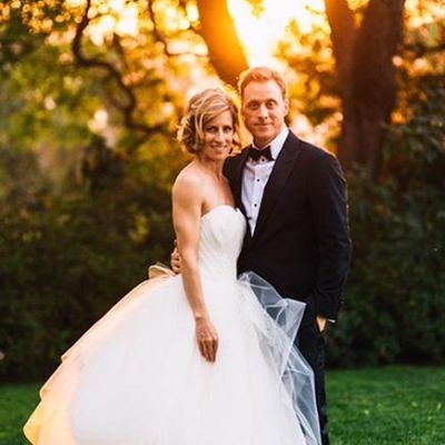 Alan Tudyk and his wife, Charissa Barton posing for an photo shoot during their wedding ceremony. I